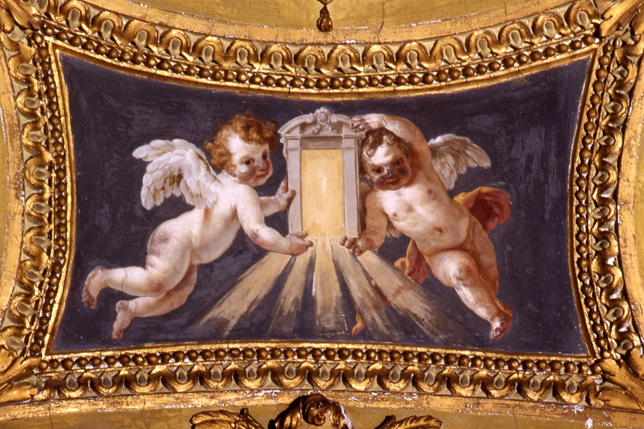 Chiesa dello Spirito Santo - Napoli, putti con simboli mariani 2